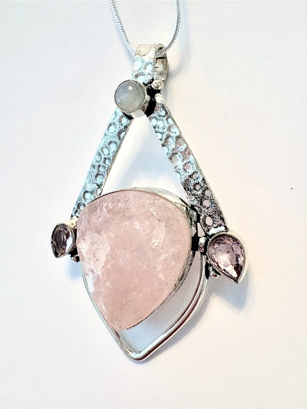 2 1/2 inch, 925 marked,, natural, rough, Rose Quartz and Pink Topaz pendant.